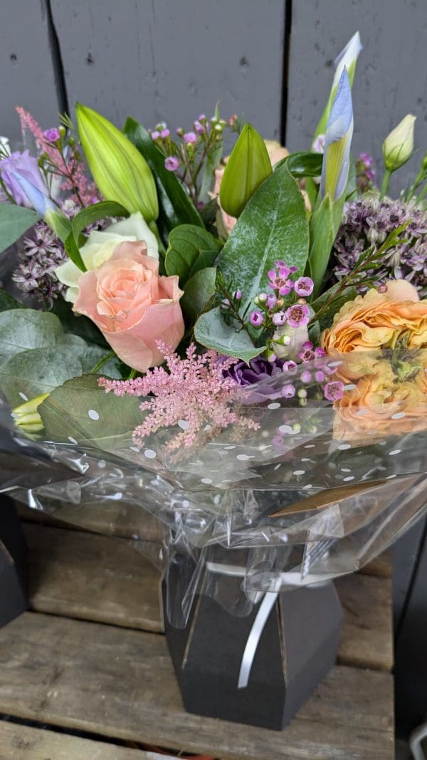 garden-of-eden-flower-shop-stocksbridge-florist-choice-bouquet-16 florist choice bouquet of flowers with pink, purple and orange colours, lilies and foliage