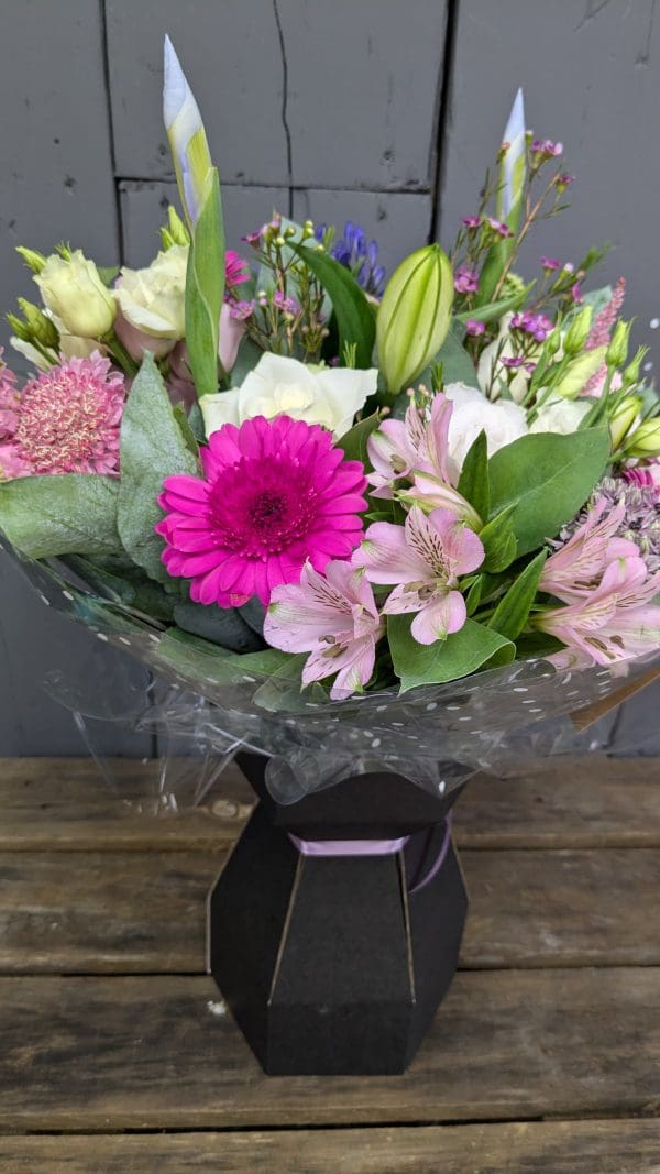 garden-of-eden-flower-shop-stocksbridge-florist-choice-bouquet-2 florist choice bouquet of flowers with bright pink and purple colours, lilies and foliage