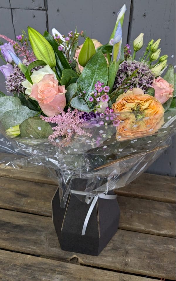 garden-of-eden-flower-shop-stocksbridge-florist-choice-bouquet-6 florist choice bouquet of flowers with pink, purple and orange colours, lilies and foliage