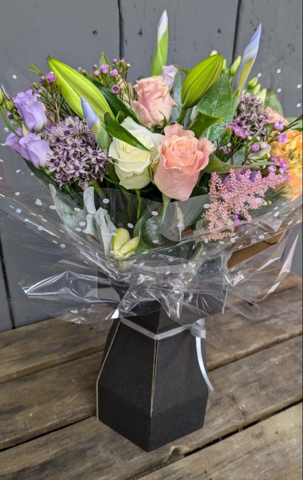 garden-of-eden-flower-shop-stocksbridge-florist-choice-bouquet-7 florist choice bouquet of flowers with pink, purple and orange colours, lilies and foliage