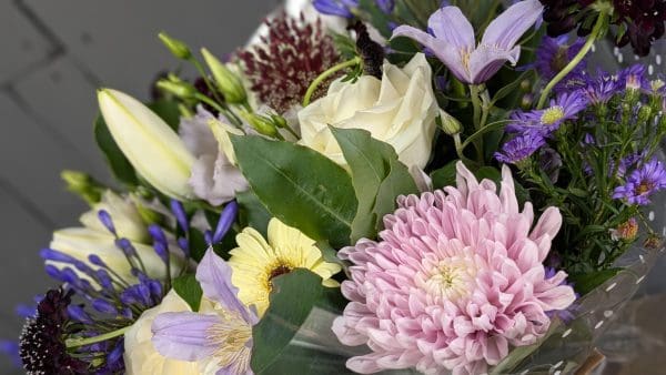 garden-of-eden-florist-stocksbridge-special-occasion Pink and white flowers in a floral bouquet